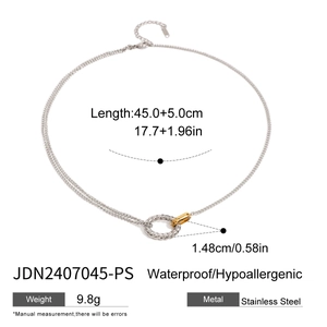 Detail view of two-tone stainless steel circle necklace with dimensions and specs