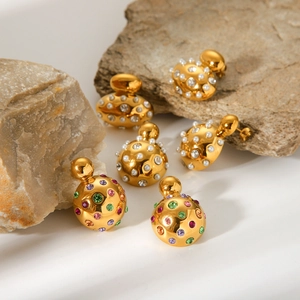 Chic gold titanium steel earrings with pearls and colorful crystals on natural stone