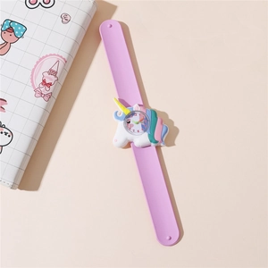 Detail of pink silicone slap watch featuring a colorful 3D unicorn and clear dial scale