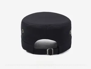 Detail view of the black canvas flat top cap back featuring an adjustable metal buckle