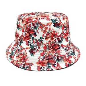 Close-up of vibrant floral pattern on a cotton bucket hat with white background