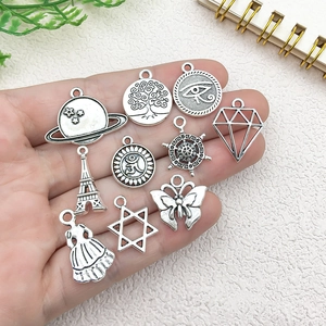 Assorted silver alloy charms featuring Eiffel Tower and stars for DIY jewelry making