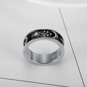 Minimalist stainless steel star and moon ring with vintage embossed celestial patterns