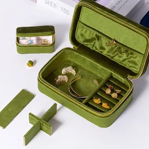 Elegant moss green velvet jewelry travel organizer with multiple storage sections