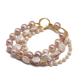 Baroque freshwater pearl bracelet with triple strands in pink purple and white tones