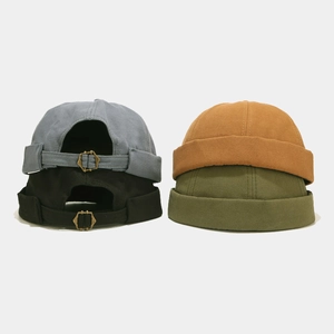 Retro brimless docker hats in four colors with adjustable metal buckles and canvas texture