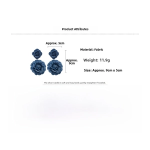 Detailed view of blue denim fabric rose earrings with dimensions 9cm by 5cm and 11.9g weight
