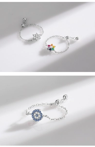 Detailed view of adjustable S925 silver soft chain rings with zircon hexagram and evil eye