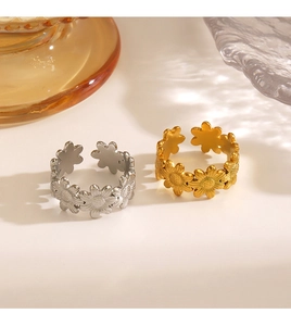 Detailed view of adjustable sunflower rings in gold and silver finish with floral pattern