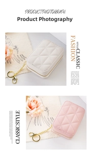 Detailed close-up of two quilted PU leather coin purses in cream and pink with chain straps