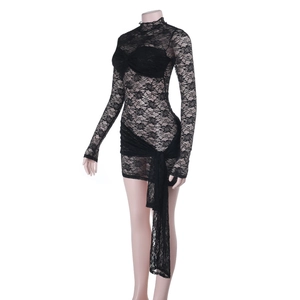 Close-up of intricate lace floral patterns on black long sleeve bodycon dress