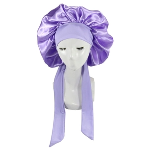 Purple large satin sleep bonnet with adjustable wide elastic straps on white mannequin head