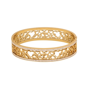 Golden hollow heart bracelet with micro-paved zircons on a clean white background