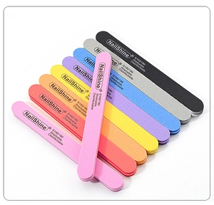 Close-up of eight colorful washable double-sided 100/180 grit professional nail files