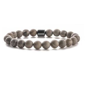 Detailed view of 8mm natural grey stone beads and hematite cylinder bead bracelet