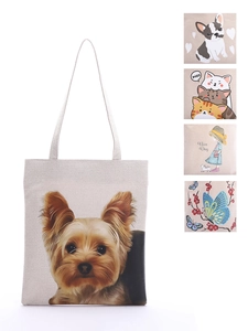 Canvas tote bag featuring a realistic Yorkshire Terrier print and multiple dog patterns