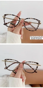 Detailed close-up of tortoiseshell cat-eye frames with stylish gold metal temples