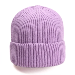 Detail view of the ribbed knit pattern and folded brim on this light purple winter beanie