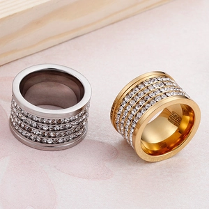 Luxurious wide band rings in gold and silver finish with five rows of sparkling crystals