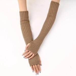 Detailed close-up of khaki ribbed knit long fingerless gloves in soft wool texture