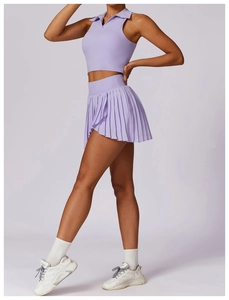 Detail of lavender polo collar cropped top and pleated tennis skirt set for women