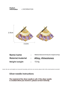 Detail view of vintage fan-shaped earrings with purple rhinestones and size measurements