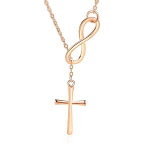 Rose gold necklace with infinity symbol and cross pendant on a clean white background