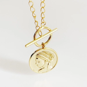 925 silver double layer necklace with gold coin pendant and OT toggle clasp on white background