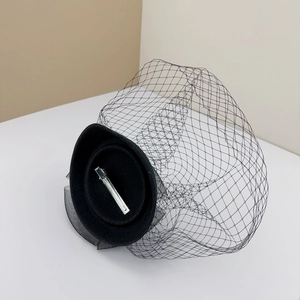 French vintage black mesh fascinator hat with flower detail for elegant evening wear