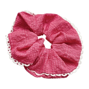 Pink waffle texture hair scrunchie with white lace trim for elegant hairstyles