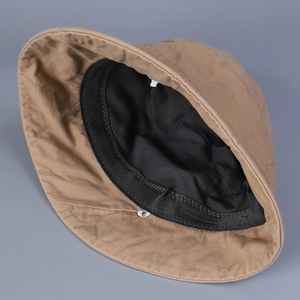 Breathable khaki cotton bucket hat for women with adjustable inner drawstring and sweatband