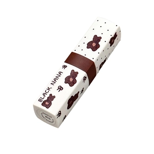 Matte lipstick in white casing with brown bear and polka dots patterns, shade #01