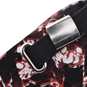Detail of adjustable metal buckle and buckle strap on crab patterned baseball cap