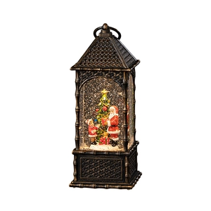 Vintage Moroccan style Christmas snow globe lantern with Santa Claus and sparkling snowflakes