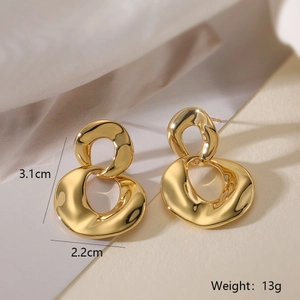 Detail view of 18k gold plated geometric drop earrings with 3.1cm height dimensions