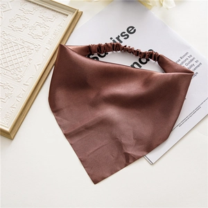 Detail of dark brown satin triangle headscarf with glossy silk-like finish and elastic band