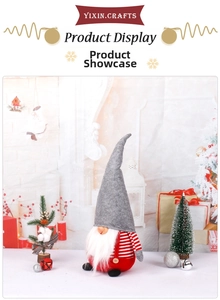 Detail of Swedish Christmas gnome with long white beard and red overalls in a festive setting