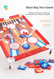 Detail view of children's bean bag toss game board with scoring holes and colorful sandbags
