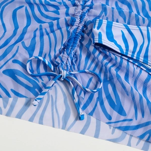 Close-up of blue zebra print mesh cover-up featuring adjustable center ruched drawstring