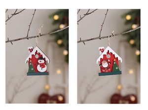 Detail of wooden 3D house ornaments featuring Santa, snowman, and festive rope hangers