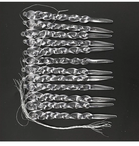 Detailed view of 12 clear spiral icicle ornaments with silver strings for Christmas trees