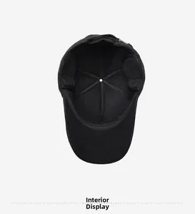 Detailed view of winter baseball cap interior featuring fleece lining and ear flaps