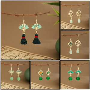 Modern Chinese emerald green fan and bamboo leaf tassel earrings with golden accents