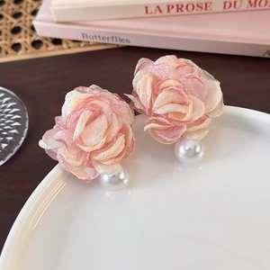 Pink chiffon floral earrings with pearls in a stylish large handmade camellia design