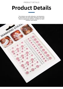 Close-up of self-adhesive pink heart and flower rhinestone stickers for makeup and nails