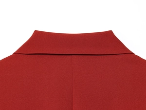 Macro view of dark red blazer collar showing fine fabric texture and sewing detail