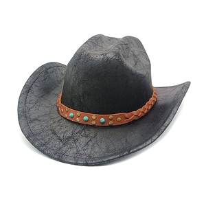 Detail of black western cowboy hat featuring crackle texture and turquoise bead hatband