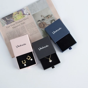 Elegant drawer jewelry gift box in pink, black, and navy for rings and necklaces