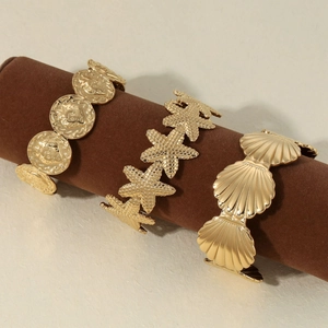 Gold stainless steel ocean series jewelry set with starfish and seashell charms