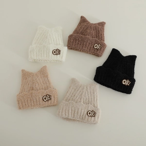 Cute kids knitted cat ear hat with 'ok!' patch in five assorted colors on white background